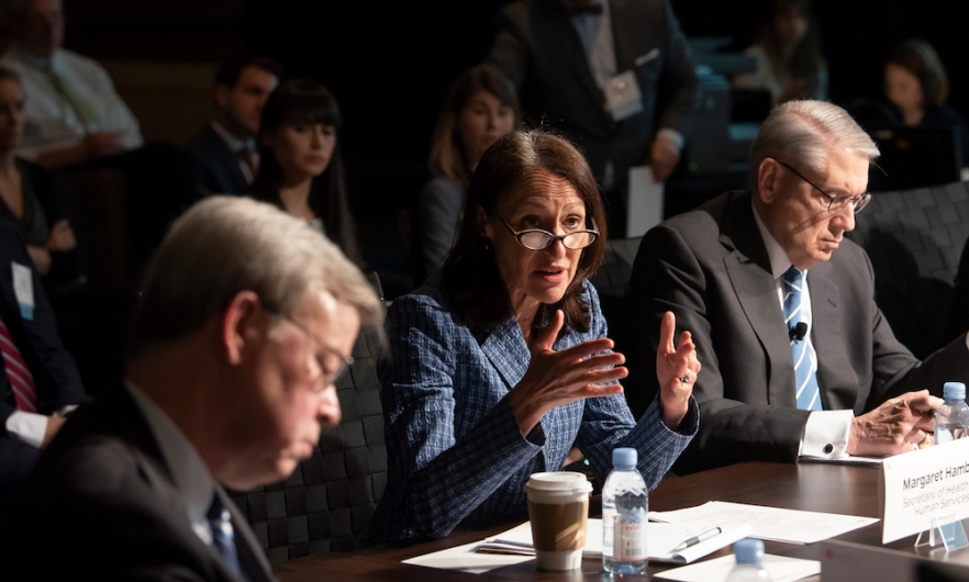 Margaret Hamburg in her exercise role as US Secretary of Health and Human Services, flanked at the Clade X EXCOMM table by Jim Talent (left) and Jeff Smith.