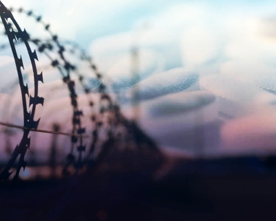 Barbed wire around prison with pills 