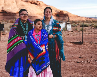 Members of a Native American tribe posing for a photo