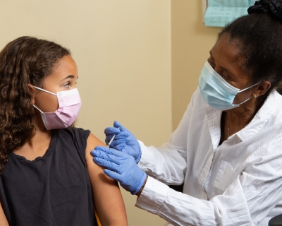 Child receiving vaccine