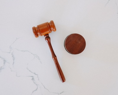 Judge's gavel against white background