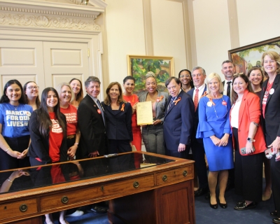 Governor John Carney and advocates at Delaware Bill Signing