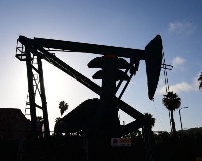 An oil pumpjack is viewed in Signal Hill, south of Los Angeles, California, on April 21, 2020.